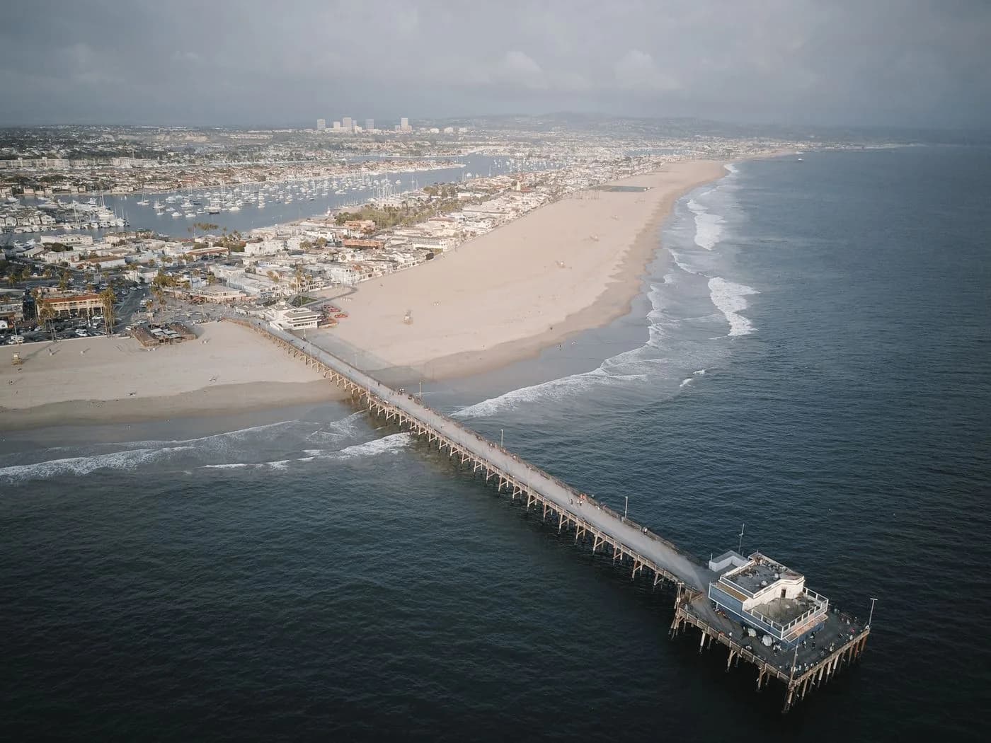 The Newport Beach coastline and pier in Orange County